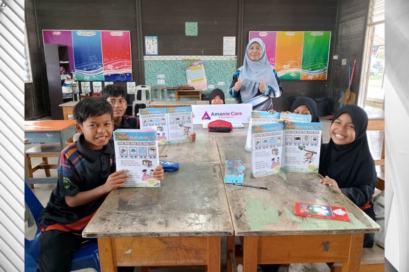 A snapshot of primary students in Kedah during their literacy class—where Amanie Care Foundation’s initiative supports the love for reading and writing, setting the foundation for lifelong learning.