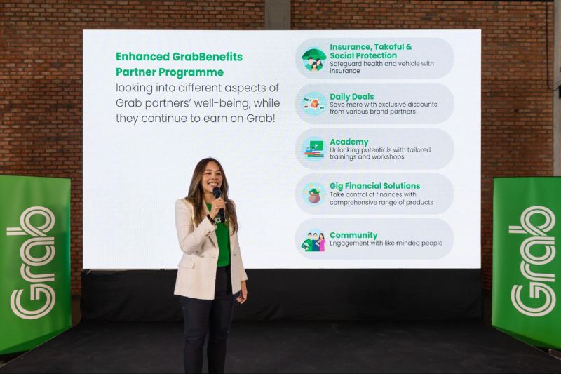 Adelene Foo, Managing Director of Grab Malaysia, unveils the enhanced GrabBenefits 2.0 program, which now features five key pillars - Insurance, Takaful &amp; Social Protection, Daily Deals, Academy, Gig Financial Solutions, and Community